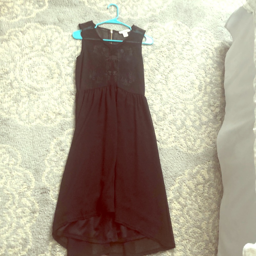 Beautiful tea length dress. Never worn before.